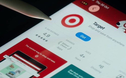 Dhaka, Bangladesh- 30 Oct 2025: Target app on a iPad screen with a pen pointing at the install