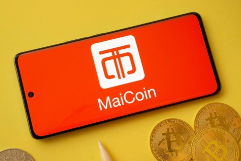 Dhaka, Bangladesh - 04 April 2025: The logo of MaiCoin is displayed on a smartphone screen