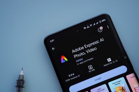 Dhaka, Bangladesh- 29 May 2025: On a blue surface, a smartphone displays the Adobe Express app