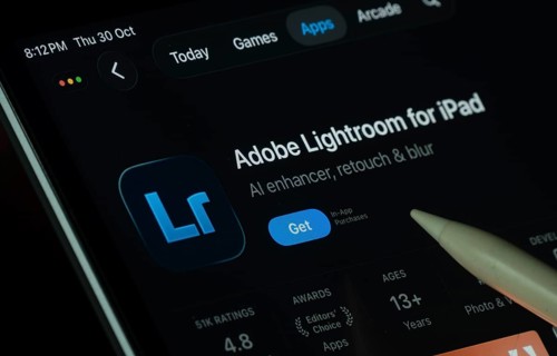Dhaka, Bangladesh- 30 Oct 2025: Adobe Lightroom app displayed on a iPad screen in dark mode with a
