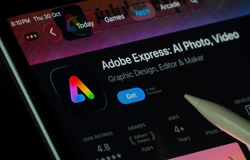 Dhaka, Bangladesh- 30 Oct 2025: Adobe Express app displayed on a iPad screen in dark mode with a