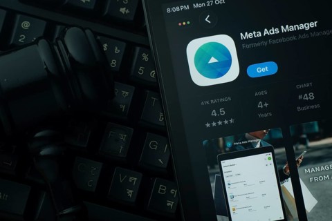 Dhaka, Bangladesh- 28 Oct 2025: An iPad displaying the meta ads manager app against a judge's gavel