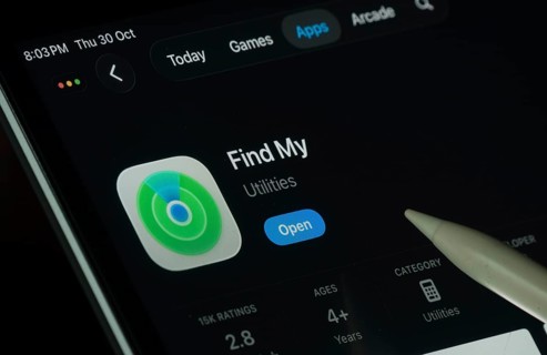 Dhaka, Bangladesh- 30 Oct 2025: Apple Find My app displayed on a iPad screen in dark mode with a