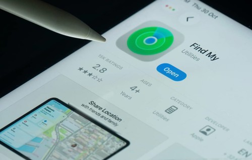 Dhaka, Bangladesh- 30 Oct 2025: Apple Find My app on a iPad screen with a pen pointing at the