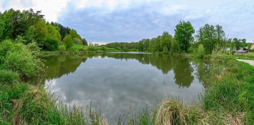 Landscape of a little lake on a cloudy day in spring, Upper Palatinate, Bavaria, Germany