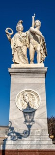 The shadow of a street lamp on the pedestals of the group of figures on the Schlossbrücke, Unter