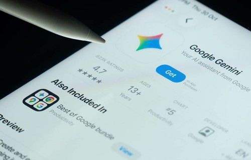 Dhaka, Bangladesh- 30 Oct 2025: Google Gemini app on a iPad screen with a pen pointing at the