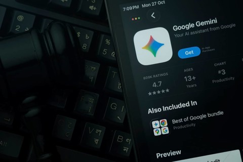 Dhaka, Bangladesh- 28 Oct 2025: An iPad displaying the Google Gemini app against a judge's gavel