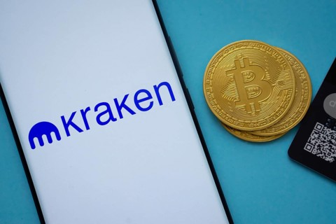 Dhaka, Bangladesh- 26 Aug 2025: Smartphone displaying Kraken logo surrounded by Bitcoin coins and
