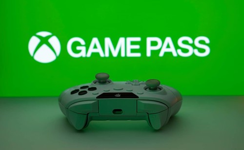 Dhaka, Bangladesh- 19 Sep 2025: A close-up of a white gamepad with the Xbox Game Pass seen on