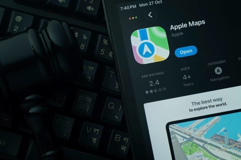 Dhaka, Bangladesh- 28 Oct 2025: An iPad displaying the Apple Maps app against a judge's gavel and