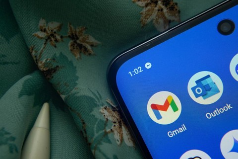 Dhaka, Bangladesh- 07 May 2025: Gmail and Outlook app icon is seen on smartphone