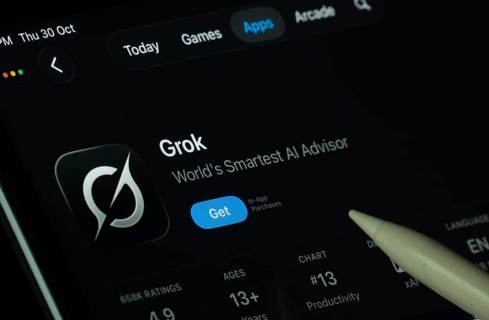 Dhaka, Bangladesh- 30 Oct 2025: Grok Ai app displayed on a iPad screen in dark mode with a digital