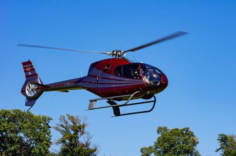 A Eurocopter EC 120B Colibri helicopter, D-HALX registration, during a flight demonstration as part