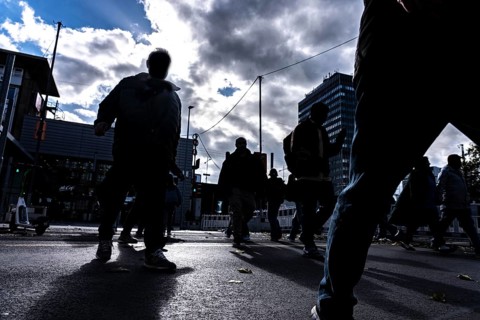 Passers-by in downtown Essen at the main train station, North Rhine-Westphalia, Germany