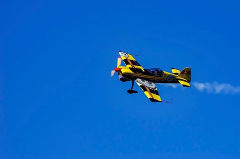 A Votec 351 sport aircraft from the Swiss MSW Aviation AG with registration HB-YMV during a flight