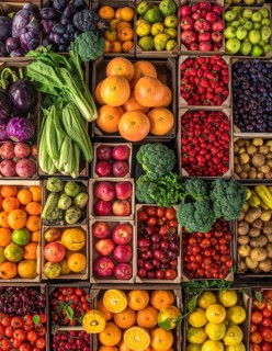 Fresh fruits and vegetables in a market display, aerial view perpendicular top down, healthy eating