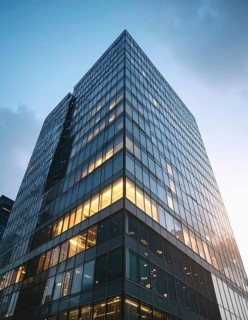 Modern building reflecting sunset light at dusk. Abstract Futuristic Business Background, AI