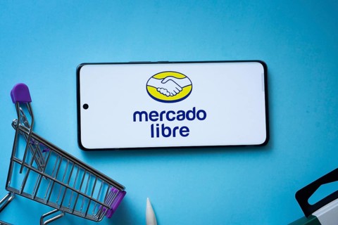 Dhaka, Bangladesh- 03 July 2025: Smartphone displaying Mercado Libre logo with shopping cart on a
