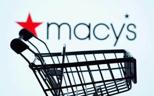 Dhaka, Bangladesh- 03 July 2025: Silhouette of a shopping cart in front of the Macy's logo,