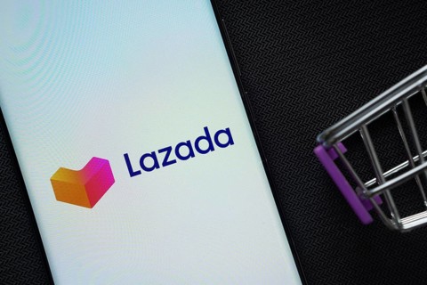 Dhaka, Bangladesh- 03 July 2025: A smartphone displaying the Lazada logo next to a miniature