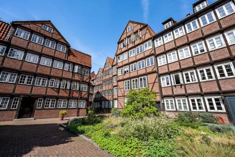Facades of the historic brick buildings, inner courtyard, view over the city, Peterstraße,