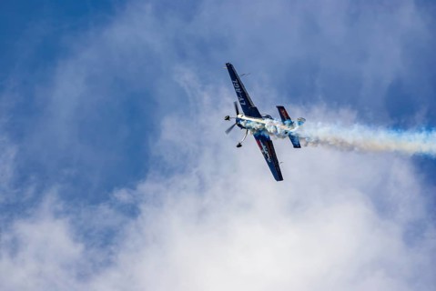 A Jakovlev Jak-55 with the registration LY-AGL during a flight demonstration as part of an air show