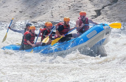A group of people white water rafting, Costa Rica, Central America