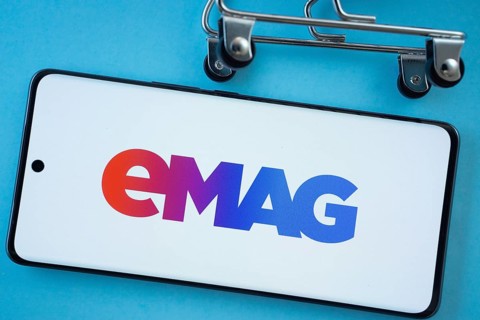 Dhaka, Bangladesh- 03 Oct 2025: Smartphone screen showing the Emag logo with shopping cart wheels