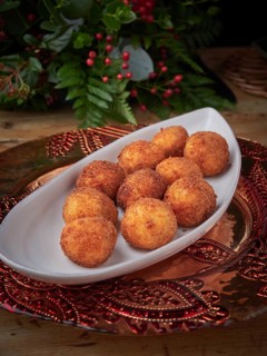 Delicious golden croquettes plating on a christmas holiday table