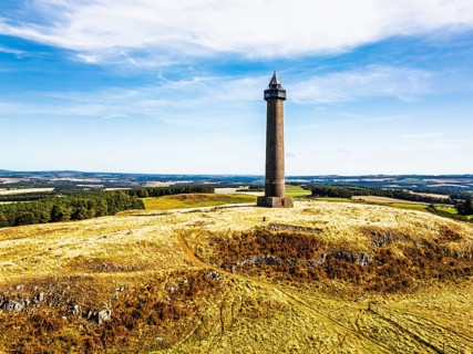 Waterloo Monument over Scottish fields and farms from a drone, Jedburgh, Scotland, UK