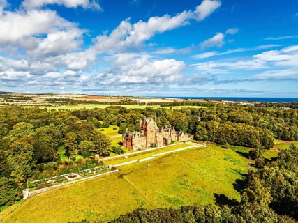 Ayton Castle from a drone, Ayton, Eyemouth, Scottish Borders, Scotland, UK