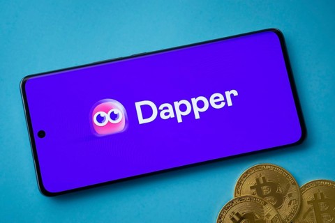 Dhaka, Bangladesh- 03 Oct 2025: Dapper logo on smartphone screen near Bitcoin coin and QR code on