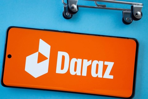 Dhaka, Bangladesh- 03 Oct 2025: Smartphone screen showing the Daraz logo with shopping cart wheels