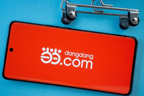 Dhaka, Bangladesh- 03 Oct 2025: Smartphone screen showing the Dangdang.com logo with shopping cart