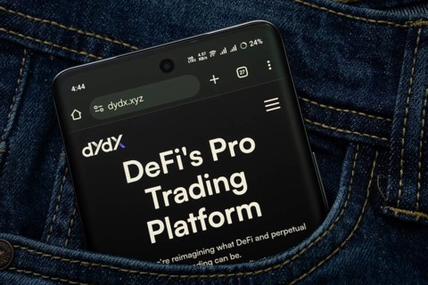 Dhaka, Bangladesh- 03 Oct 2025: A smartphone displaying the Dydx web interface peeks out of a denim