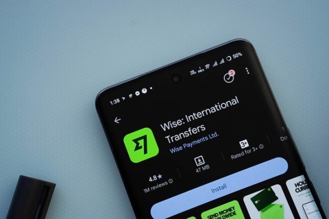 Dhaka, Bangladesh- 29 May 2025: On a blue surface, a smartphone displays the Wise app within the