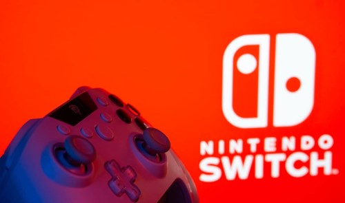 Dhaka, Bangladesh- 15 July 2025: A close-up of a gamepad with thenintendo switch seen on screen in