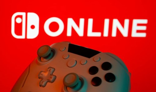 Dhaka, Bangladesh- 15 July 2025: Game controller in front of nintendo online logo on a background