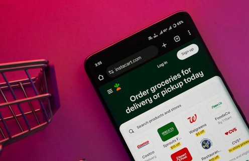 Dhaka, Bangladesh- 23 June 2025: A smartphone displaying the Instacart website with a shopping cart