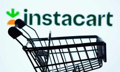 Dhaka, Bangladesh- 03 July 2025: Silhouette of a shopping cart in front of the Instacart logo,