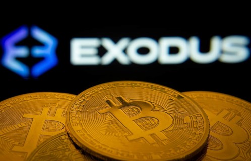 Dhaka, Bangladesh- 06 Sep 2025: Close-up of Bitcoin coins with the Exodus logo visible on a screen