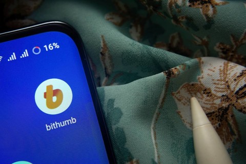 Dhaka, Bangladesh- 07 May 2025: Bithumb app icon is seen on smartphone