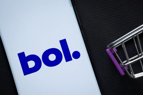 Dhaka, Bangladesh- 03 July 2025: A smartphone displaying the bol logo next to a miniature shopping