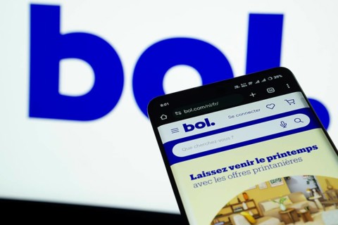 Dhaka, Bangladesh- 03 July 2025: Smartphone displaying bol web interface against bol logo