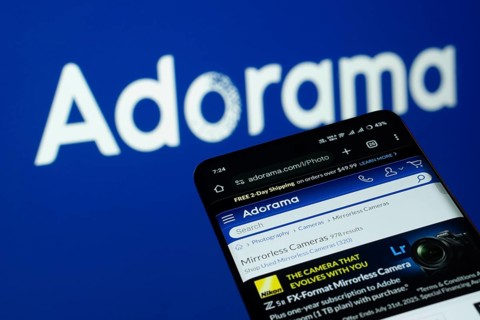 Dhaka, Bangladesh- 03 July 2025: Smartphone displaying Adorama web interface against adorama logo