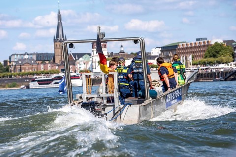 Multi-purpose boat of the THW during a training trip on the Rhine near Düsseldorf, the specialist