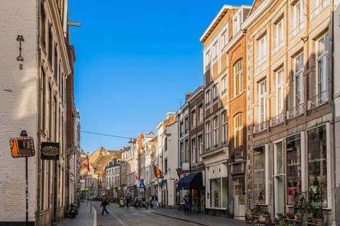 Alley with cafes and shops in the old town of Maastricht, the Netherlands