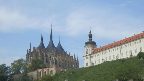 Historical ossuary, ossuary, Sedlec bone church, with towers under a blue sky, Kutna Hora, Czech