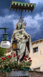 Sculpture of the Virgin and Child under a canopy, Venice, Veneto, Italy